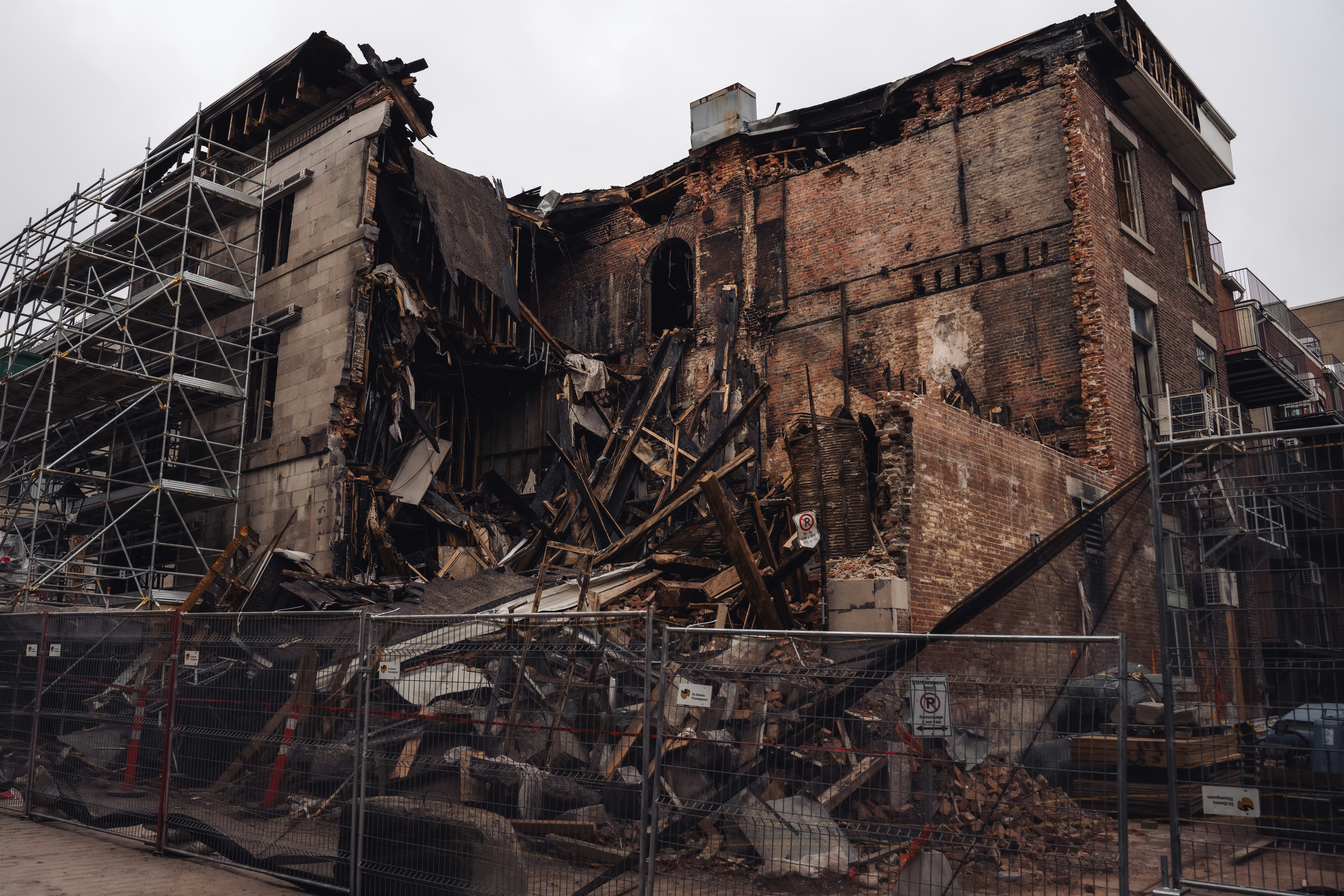 A damaged building is partially collapsed
